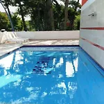 Enjoy Your Escape By The Pool